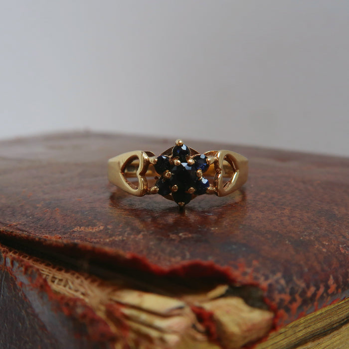 Dark Sapphire Flower Cluster Ring with Heart Detail